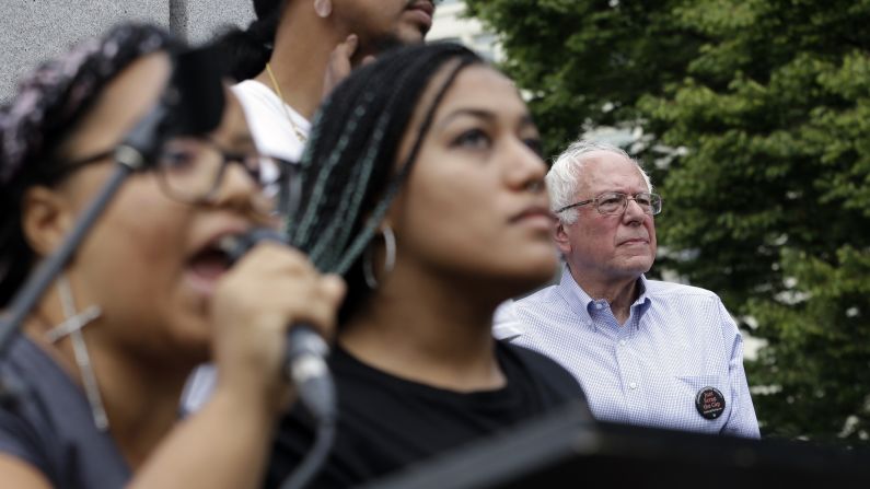 Seconds after Sanders took the stage for a campaign rally in August 2015, a dozen protesters from Seattle's Black Lives Matter chapter <a href="http://www.cnn.com/2015/08/08/politics/bernie-sanders-black-lives-matter-protesters/index.html" target="_blank">jumped barricades and grabbed the microphone</a> from the senator. Holding a banner that said "Smash Racism," two of the protesters -- Marissa Johnson, left, and Mara Jacqueline Willaford -- began to address the crowd.