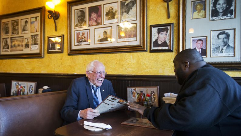 Sanders sits with rapper and activist Killer Mike at the Busy Bee Cafe in Atlanta in November 2015. That evening, Killer Mike <a href="http://www.cnn.com/2015/11/24/politics/bernie-sanders-killer-mike/index.html" target="_blank">introduced Sanders at a campaign event</a> in the city. "I'm talking about a revolutionary," the rapper told supporters. "In my heart of hearts, I truly believe that Sen. Bernie Sanders is the right man to lead this country."