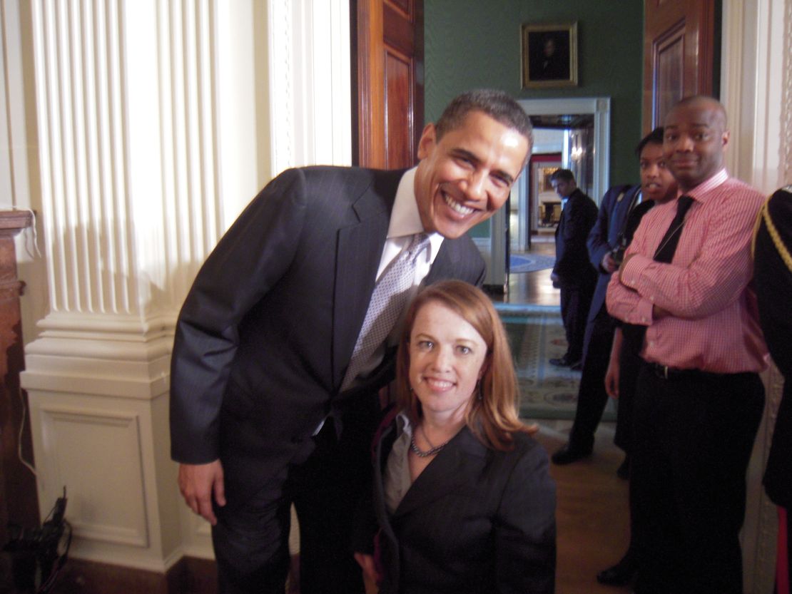 Rebecca Cokley and President Obama pose for a snapshot.