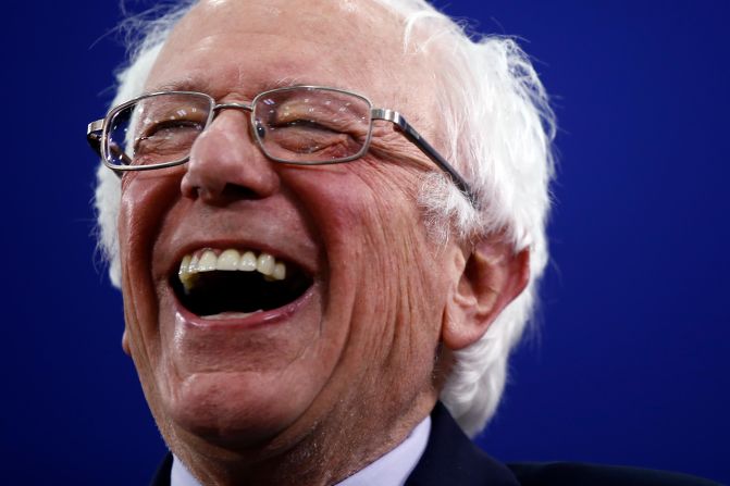 Sanders laughs during a primary-night rally in Manchester, New Hampshire, in February 2020. Sanders won <a href="https://www.cnn.com/2020/02/09/politics/gallery/new-hampshire-primary-2020/index.html" target="_blank">the primary,</a> just as he did in 2016.