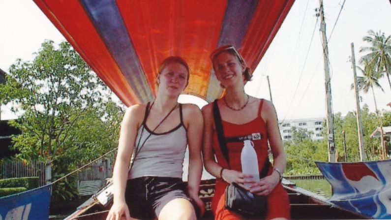 <strong>Partners in crime:</strong> Jodi and I (L-R) -- seen here exploring Bangkok's canals on a longboat -- saved for months then quit our jobs in Canada, excited for the year of adventures that lay ahead of us. 