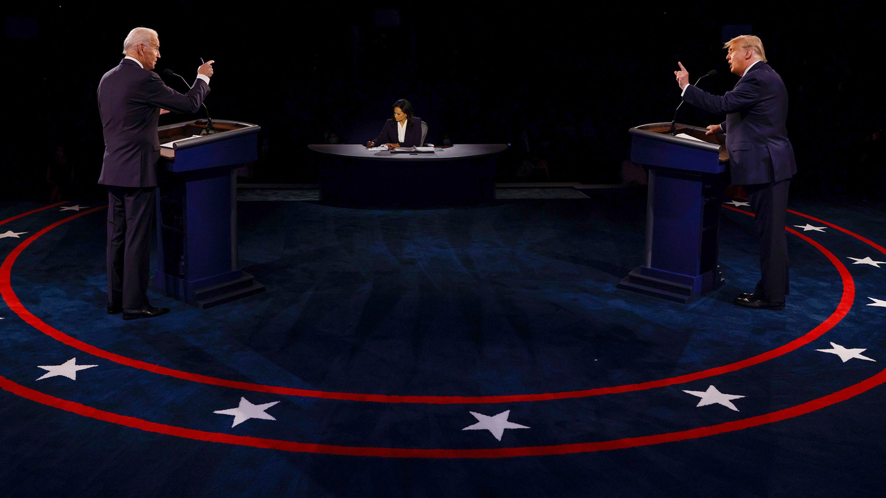 Then-President Donald Trump, right, and Democratic challenger Joe Biden debate each other in Nashville, Tennessee, on October 22, 2020. At center is moderator Kristen Welker of NBC.