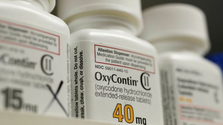 Bottles of prescription painkiller OxyContin made by Purdue Pharma LP sit on a shelf at a local pharmacy in Provo, Utah, U.S., April 25, 2017.   REUTERS/George Frey