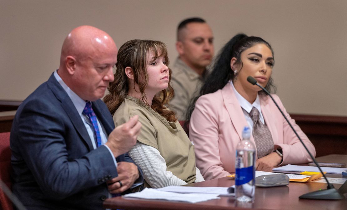 Hannah Gutierrez-Reed, the former armorer of the movie "Rust," sits with her attorney Jason Bowles and paralegal Carmella Sisneros, during her sentencing hearing in Santa Fe, New Mexico.