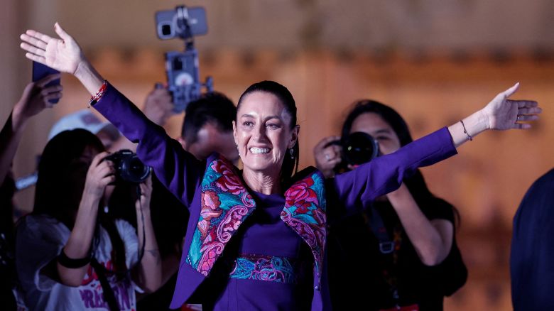 Claudia Sheinbaum gestures to supporters after being declared the winner of the presidential election according to the INE electoral institute's rapid sample count, in the Zocalo plaza in Mexico City, Mexico June 3, 2024. REUTERS/Daniel Becerril