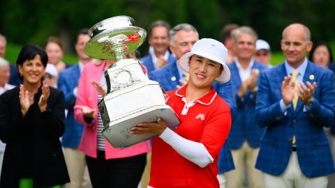 Jun 23, 2024; Sammamish, Washington, USA; Amy Yang holds the trophy after winning the KPMG Women's PGA Championship golf tournament. Mandatory Credit: Steven Bisig-USA TODAY Sports