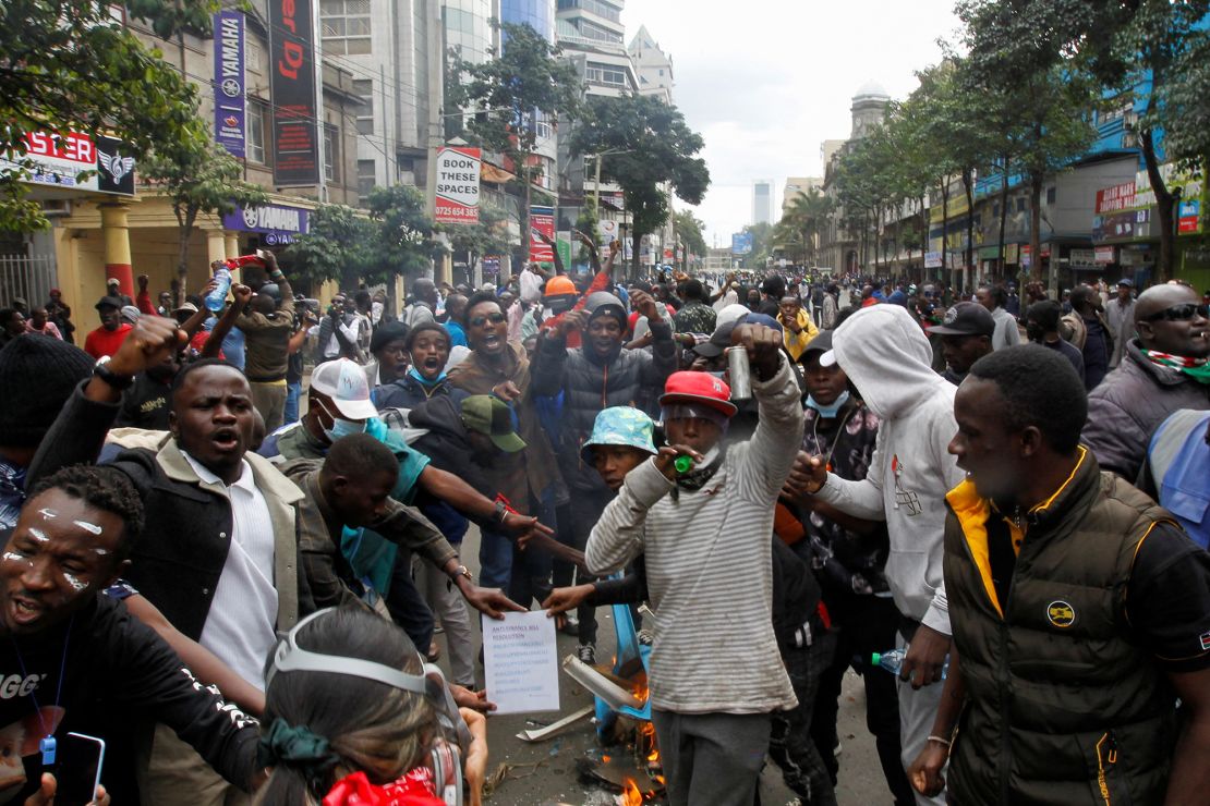 People take part in demonstrations on Thursday