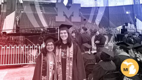 Anushka Jalisatgi, left, and Jade Gray attend the University of Michigan's 2024 spring commencement.