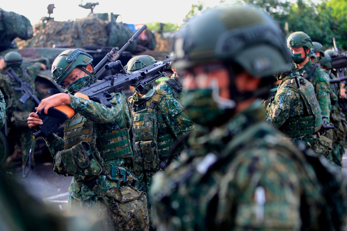 Taiwanese soldiers are seen holding grenade launchers and machine guns and driving tanks, during a military exercise, in Tainan, Taiwan, on September 14, 2021. 