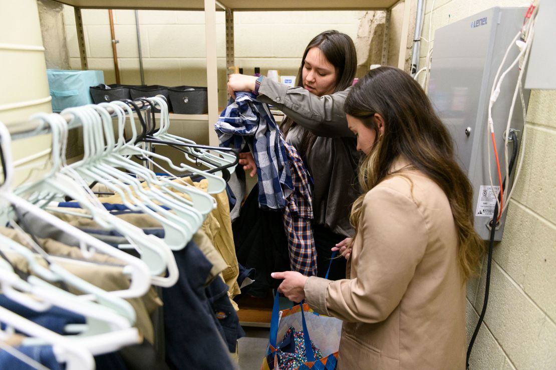 Mercy Johnson, right, of The Bail Project, and Kelsey Trejo, of the Tulsa County Public Defender's Office, prepare clothing and hygiene items for a client on March 9 at the county courthouse in Tulsa, Oklahoma.