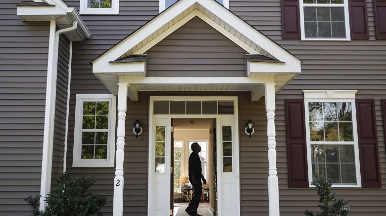 In this July 21, 2020, file photo, a homeowner tours their new home, in Washingtonville, N.Y.