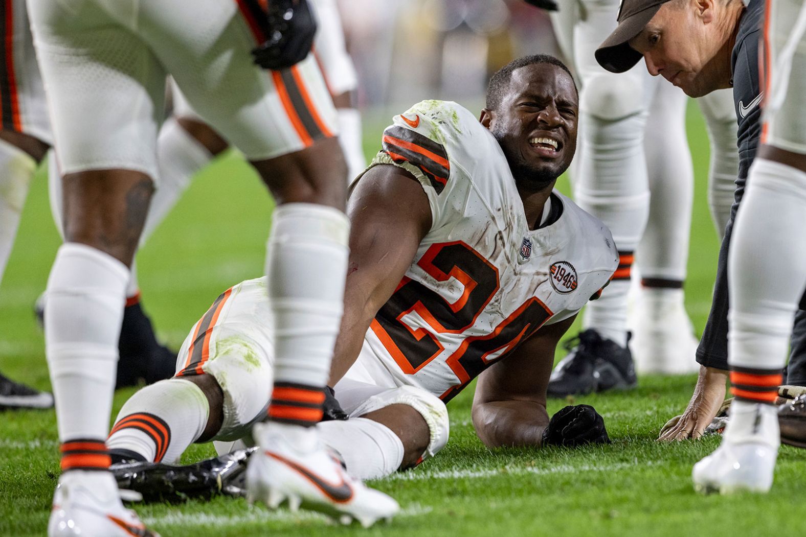 Cleveland Browns running back Nick Chubb grimaces after <a href="https://www.cnn.com/2023/09/18/sport/nick-chubb-cleveland-browns-knee-injury-spt/index.html" target="_blank">suffering a knee injury</a> in a Monday Night Football game against the Pittsburgh Steelers on September 18. He was carted off the field in the second quarter. Before leaving the game, the star running back had 10 carries for 64 yards.