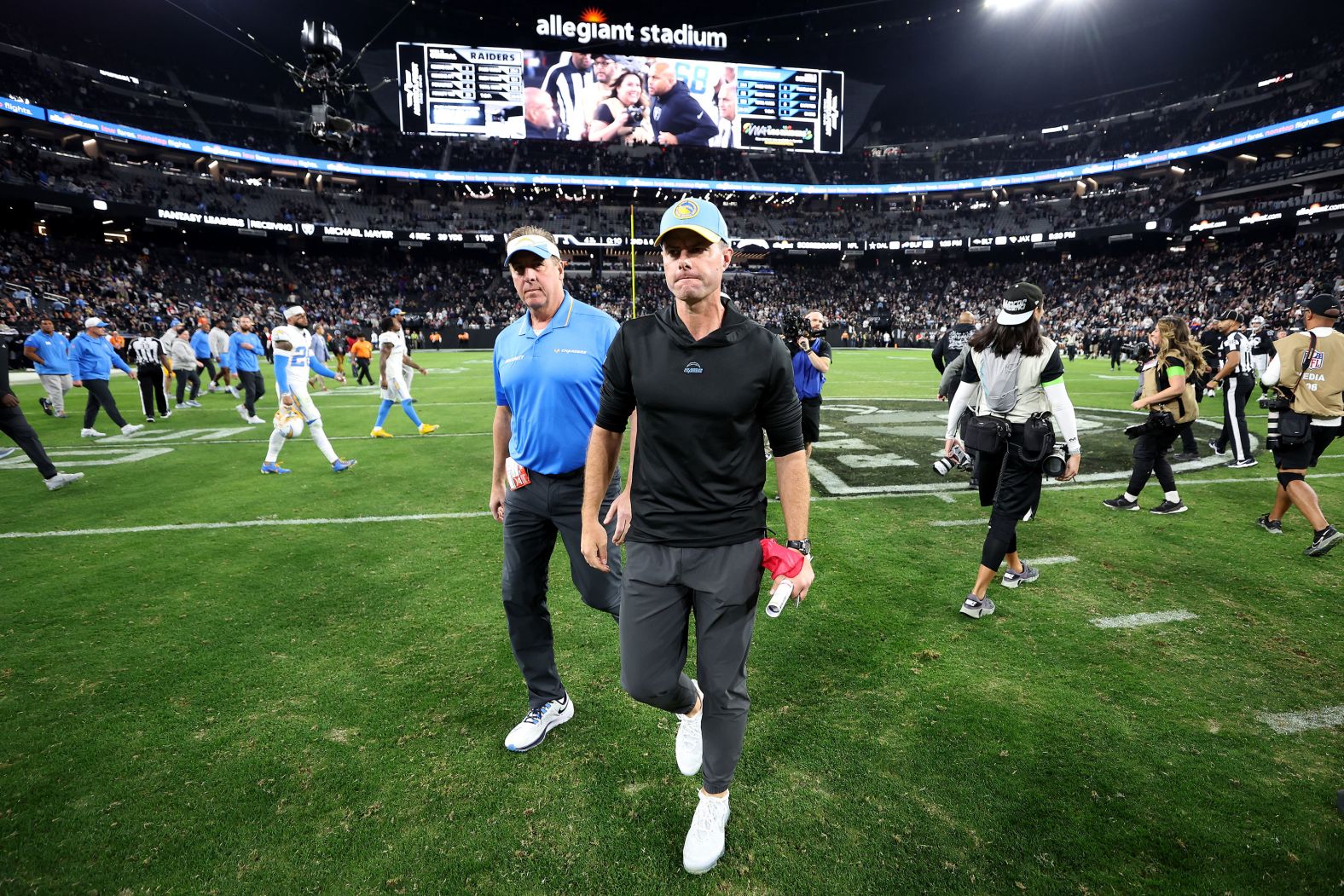 Los Angeles Chargers head coach Brandon Staley walks off of the field after losing 63-21 to the Las Vegas Raiders on Thursday, December 14. <a href="https://www.cnn.com/2023/12/15/sport/los-angeles-chargers-fire-brandon-staley-tom-telesco-spt-intl/index.html" target="_blank">Staley and general manager Tom Telesco were fired the next day</a>. The game was a franchise record for points scored by the Raiders, and a franchise worst for points allowed by the Chargers, <a href="https://www.nfl.com/news/rookie-qb-aidan-o-connell-propels-raiders-to-historic-blowout-over-chargers" target="_blank" target="_blank">per NFL.com</a>.
