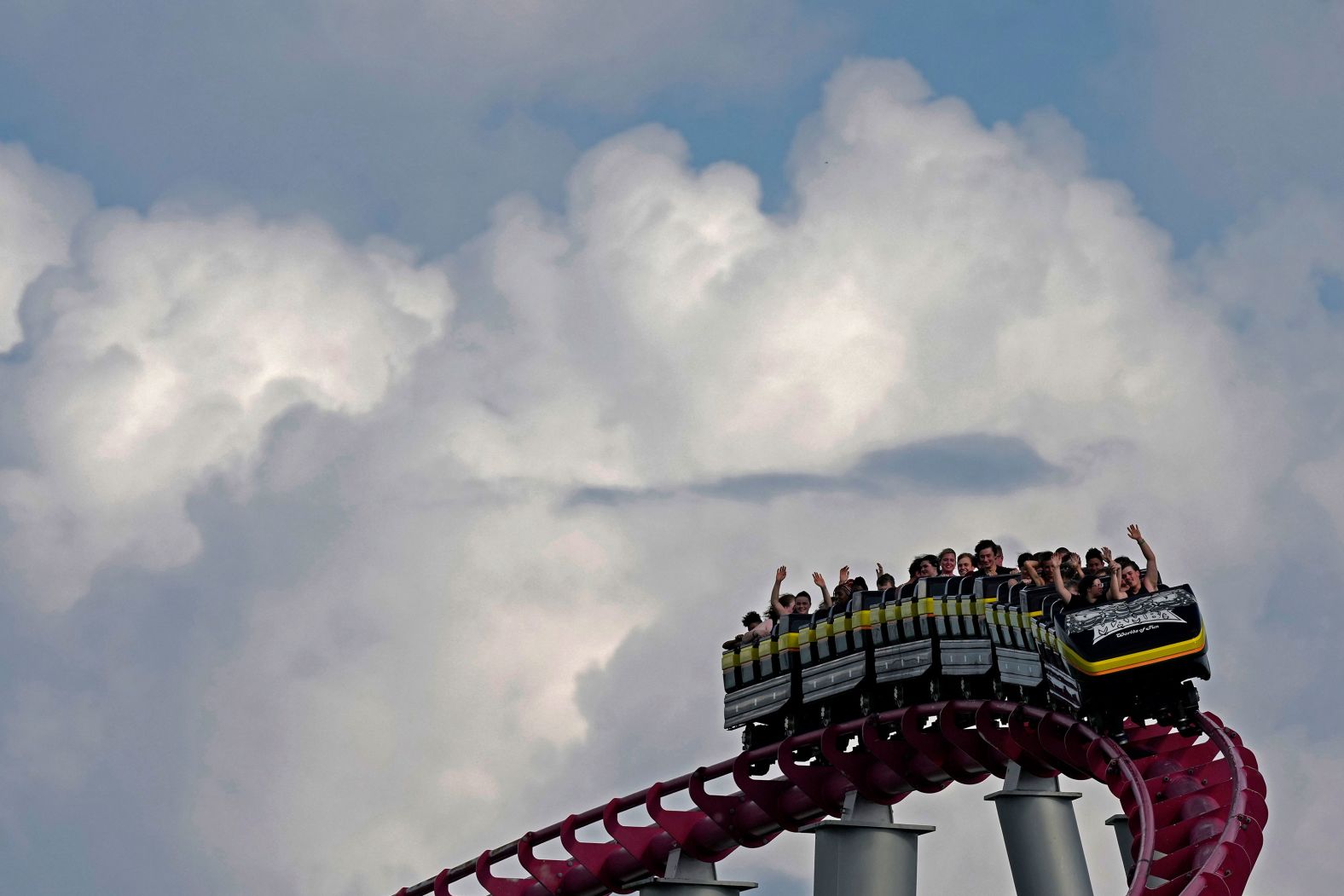 People ride the Mamba roller coaster at the Worlds of Fun theme park in Kansas City, Missouri, on Friday, June 21.