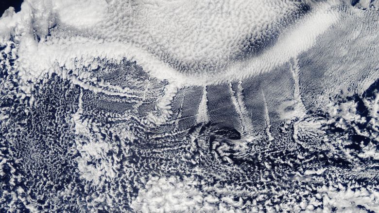 Summer Ship Tracks in the Pacific

August 26, 2018

In August 2018, long, narrow clouds stood out against the backdrop of marine clouds blanketing much of the North Pacific Ocean. Known as ship tracks, the distinctive clouds form when water vapor condenses around the tiny particles emitted by ships in their exhaust. Ship tracks typically form in areas where thin, low-lying stratus and cumulus clouds are present.

...

The Moderate Resolution Imaging Spectroradiometer (MODIS) on Aqua captured this natural-color image of several ship tracks extending northward on August 26, 2018. The clouds were located about 1,000 kilometers (600 miles) west of the California-Oregon border. Similar environmental conditions also triggered the formation of ship tracks in this part of the Pacific on August 27 and 28.