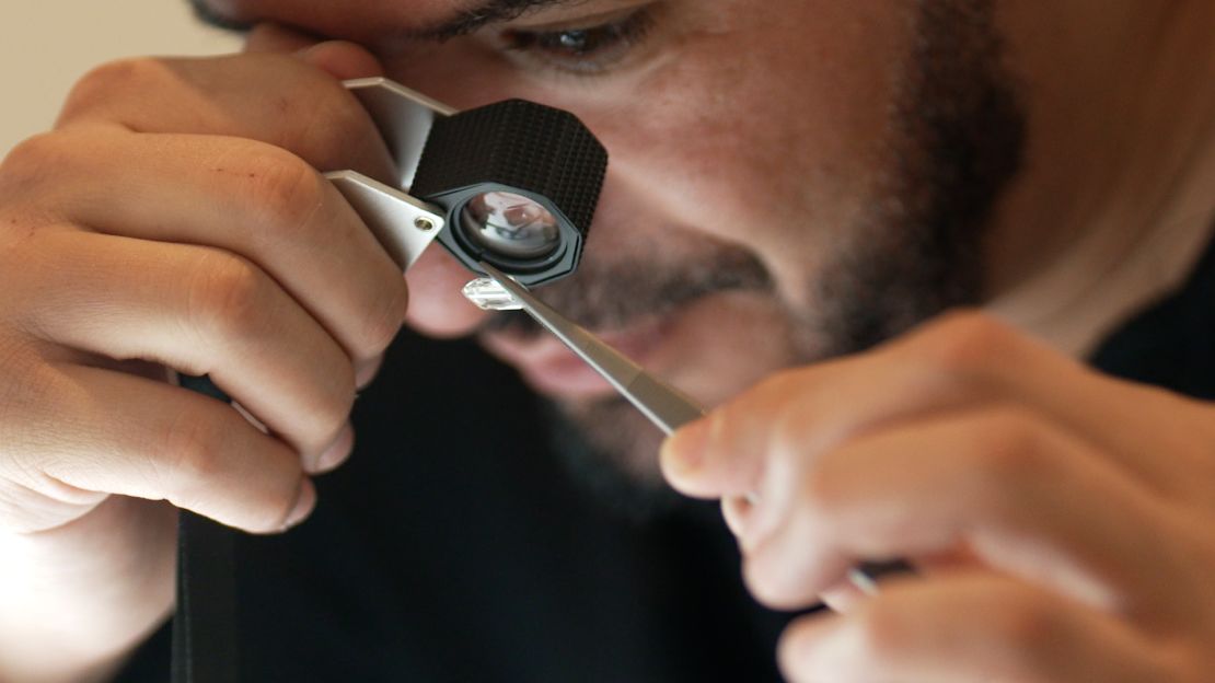 Mohamed Sabeg, co-founder of 2DOT4, checking a lab-grown diamond. Filmed for Think Big / Dubai Now in Feb 2024.