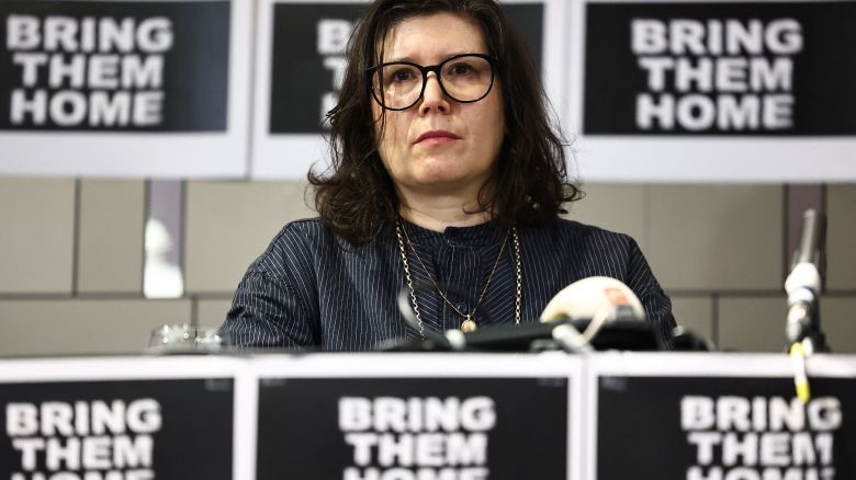 London-based British-Israelis Sharon Lifschitz, whose parents were taken hostage from the Nir Oz Kibbutz during the surprise attack on Israel by the Palestinian militant group Hamas, attend a press conference hosted by Defend Israeli Democracy UK, in London on October 12, 2023. British-based relatives of Israelis believed taken hostage by Hamas militants begged for the safe release of their loved ones during an emotional press conference in London on Thursday. (Photo by HENRY NICHOLLS / AFP) (Photo by HENRY NICHOLLS/AFP via Getty Images)