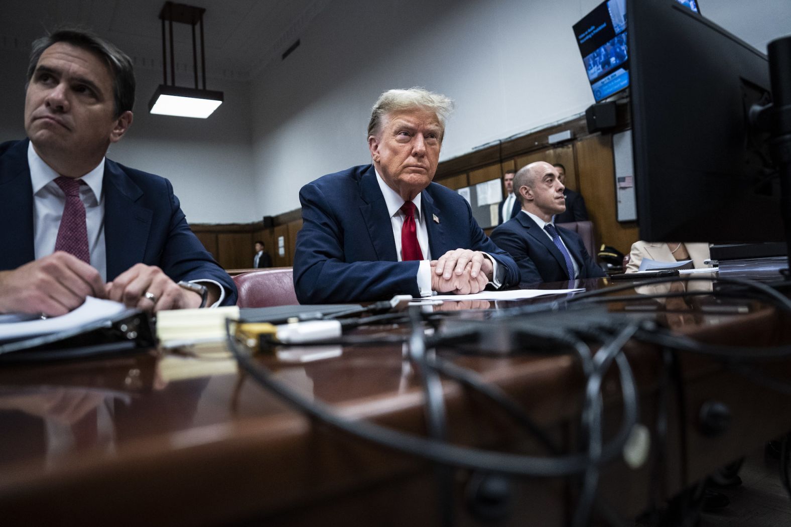 Trump arrives at court with his legal team ahead of the start of jury selection on April 15.