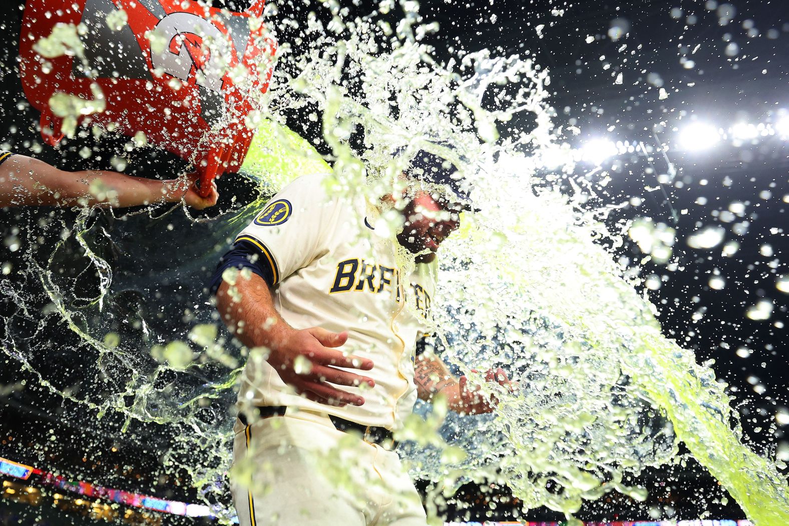 Milwaukee Brewers pitcher Bryse Wilson is doused by teammate Willy Adames after a 3-1 home victory over the Texas Rangers on Tuesday, June 25. Wilson threw six scoreless innings in the game.