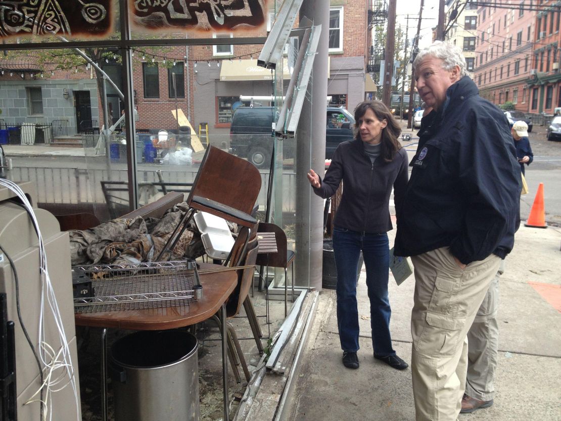 2KXWYP0 Hoboken, N.J., Nov. 1, 2012 FEMA Deputy Administrator Richard Serino is shown damaged businesses in Hoboken, New Jersey by Hoboken Mayor Dawn Zimmer. Hurricane Sandy damaged hundreds of businesses and left most of the town under water. New Jersey Hurricane Sandy. Photographs Relating to Disasters and Emergency Management Programs, Activities, and Officials