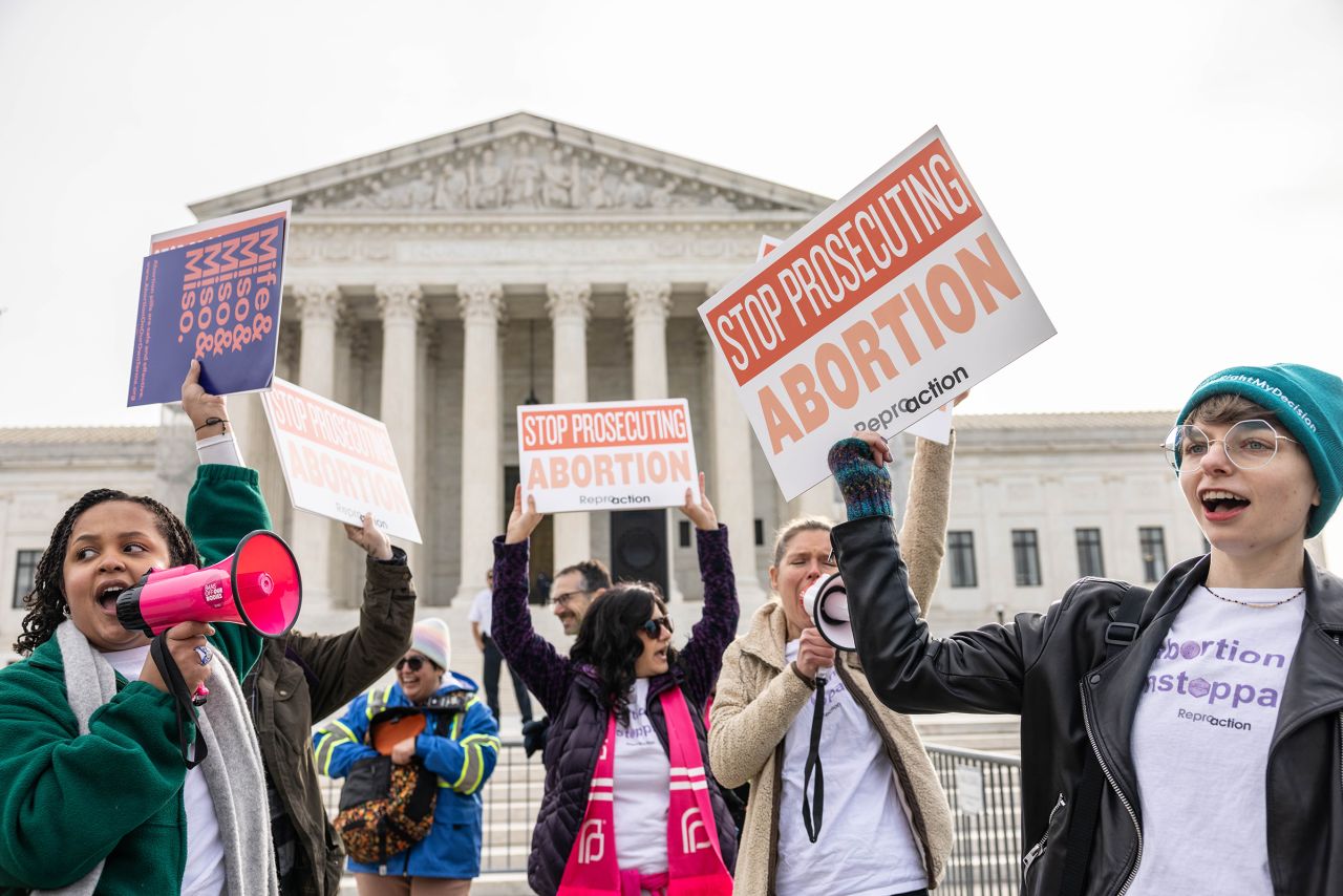 Demonstrators gather in front of the Supreme Court as the court hears oral arguments in the case of the US Food and Drug Administration v. Alliance for Hippocratic Medicine on March 26, in Washington, DC. 