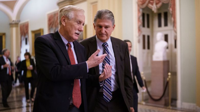 Sen. Angus King, I-Maine, left, and Sen. Joe Manchin, D-W.Va., walk to the chamber as the Senate tries to finish to its work going into the Memorial Day recess with Republican leaders insisting they will block a commission on the Jan. 6 insurrection, at the Capitol in Washington, Friday, May 28, 2021. Lawmakers are also set to approve a big innovation bill aimed at making the U.S. more competitive with China and other countries. (AP Photo/J. Scott Applewhite)