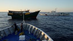 A Chinese coast guard ship, right, blocks Philippine resupply vessel Unaizah May 4, center, and Philippine coast guard BRP Sindangan as they tried to enter the Second Thomas Shoal, locally known as Ayungin Shoal, in the disputed South China Sea Tuesday, March 5, 2024. Chinese and Philippine coast guard vessels collided in the disputed South China Sea and multiple Filipino crew members were injured in high-seas confrontations Tuesday as Southeast Asian leaders gathered for a summit that was expected to touch on Beijing's aggression at sea. (AP Photo/Aaron Favila)