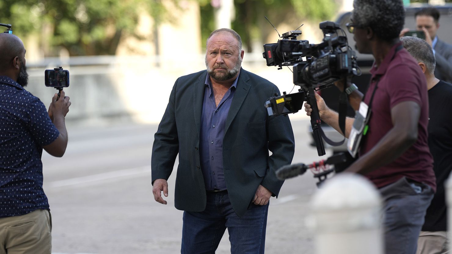 Right-wing conspiracy theorist Alex Jones arrives at the federal courthouse for a hearing in front of a bankruptcy judge Friday, June 14, 2024, in Houston.