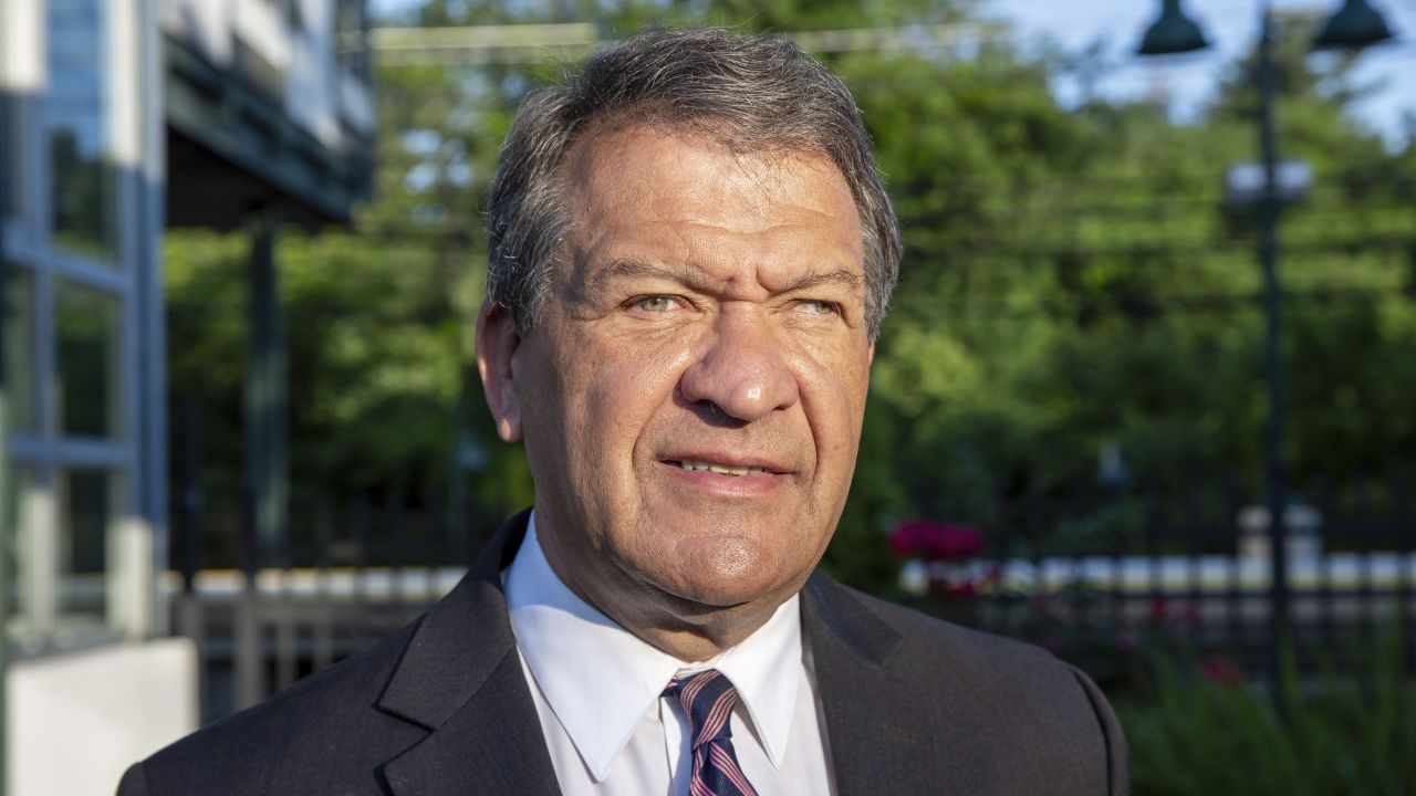 Westchester County Executive George Latimer campaigns at a train station in White Plains, New York, on June 13.