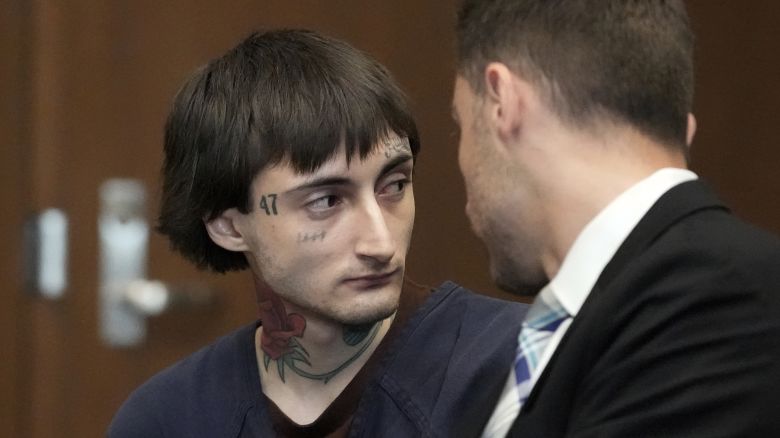 Robert E. Crimo III, left, talks to Lake County's assistant public defender Anton Trizna as he appears before Judge Victoria A. Rossetti at the Lake County Courthouse in Waukegan, Ill., Wednesday, June 26, 2024. Crimo III is charged with killing seven people and wounding dozens more in a shooting at an Independence Day parade in the suburban Chicago town of Highland Park, Ill.