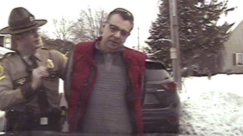 This image taken from police dashcam video shows Gregory Bombard getting arrested on Feb. 9, 2018 n St. Albans, Vt.  Vermont has agreed to pay $175,000 to settle a lawsuit on behalf of Bombard who was charged with a crime for giving a state trooper the middle finger in 2018, the state chapter of the American Civil Liberties Union said Wednesday, June 26, 2024. (American Civil Liberties Union/Vt. State Police via AP)