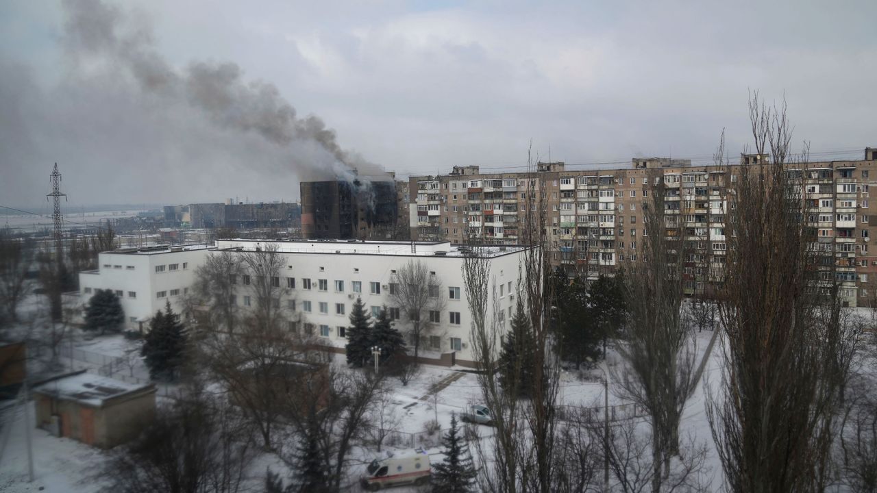 Smoke is seen from an apartment building after the shelling of a residential district in Mariupol, Ukraine on March 11. 