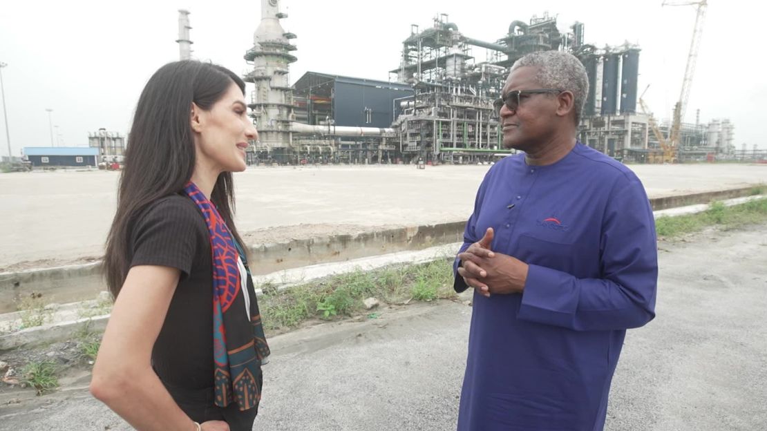 Aliko Dangote walks CNN's Eleni Giokos through his oil refinery in Lekki, Nigeria.