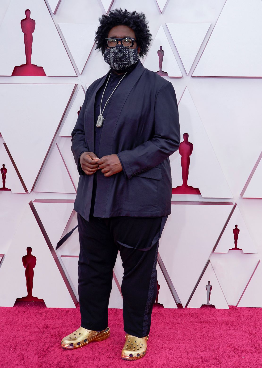 Questlove attends the 93rd Annual Academy Awards on April 25, 2021 in bold gold Crocs matching the color of an Oscar statuette.