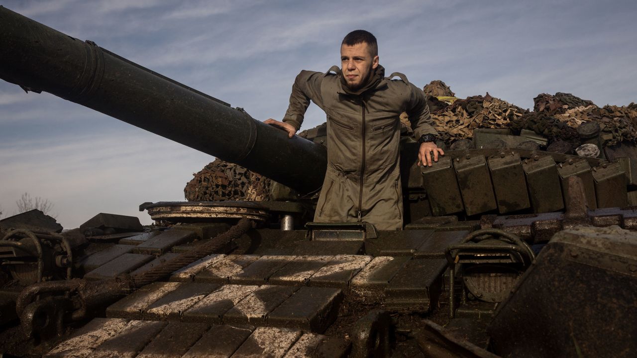 A member of the Ukrainian military, 59th Brigade, waits to take on new supplies before moving to a new position in November 2022 in Kherson, Ukraine.