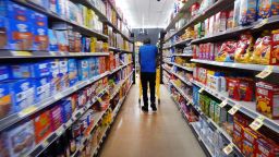 CHICAGO, ILLINOIS - AUGUST 31: A customer shops at a Dollar General store on August 31, 2023 in Chicago, Illinois. Dollar General stock plunged more than 12 percent today as the retail chain, faced with declining consumer demand and heavy losses attributed to retail theft, missed analysts expectation. (Photo by Scott Olson/Getty Images)