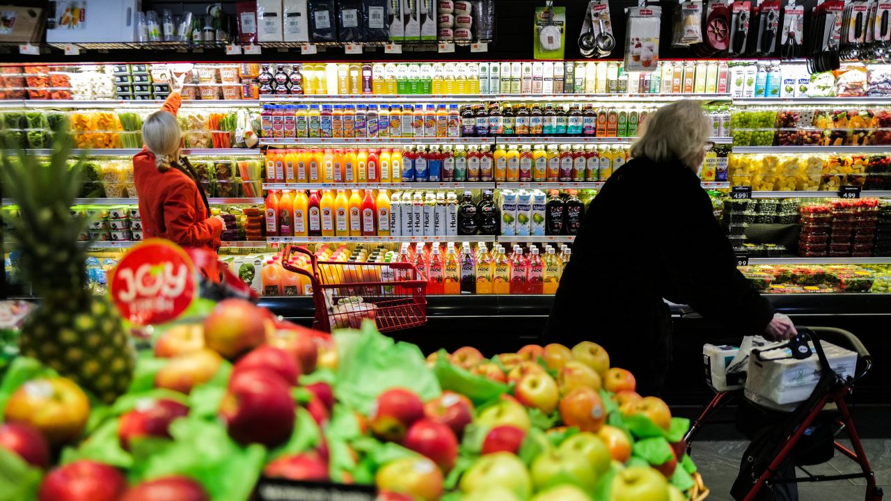 People shop in a supermarket in the Manhattan borough of New York city on January 27, 2024.