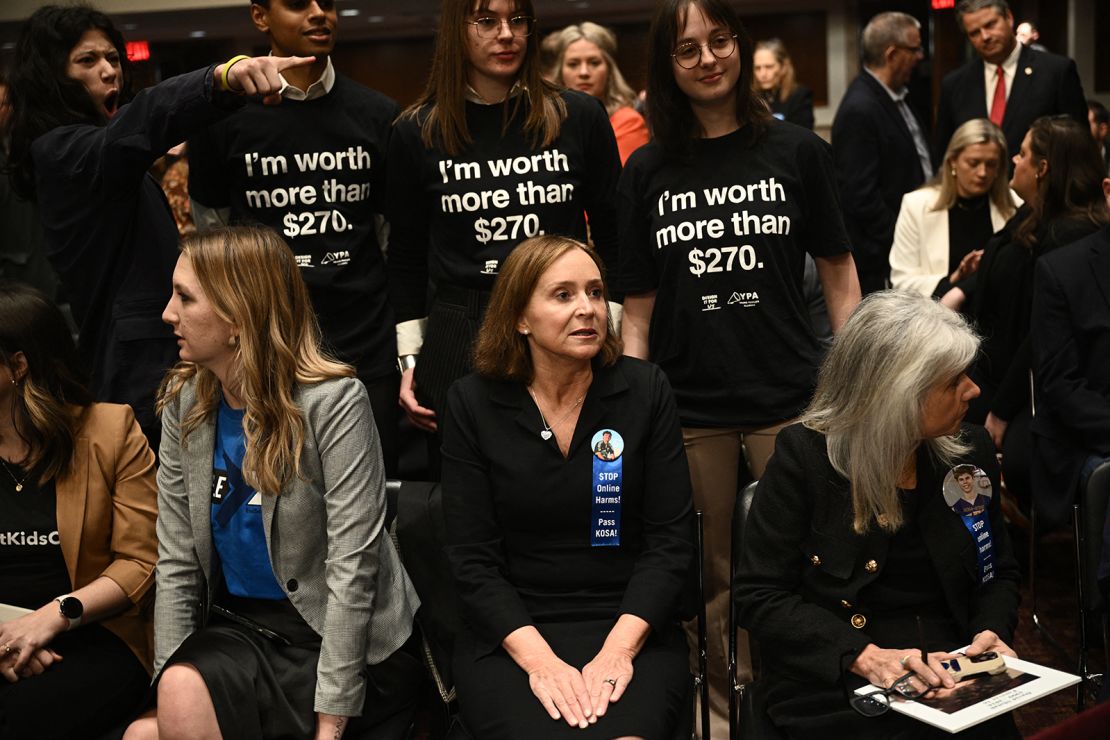 People arrive to attend the US Senate Judiciary Committee hearing, "Big Tech and the Online Child Sexual Exploitation Crisis," in Washington, DC, on January 31, 2024.