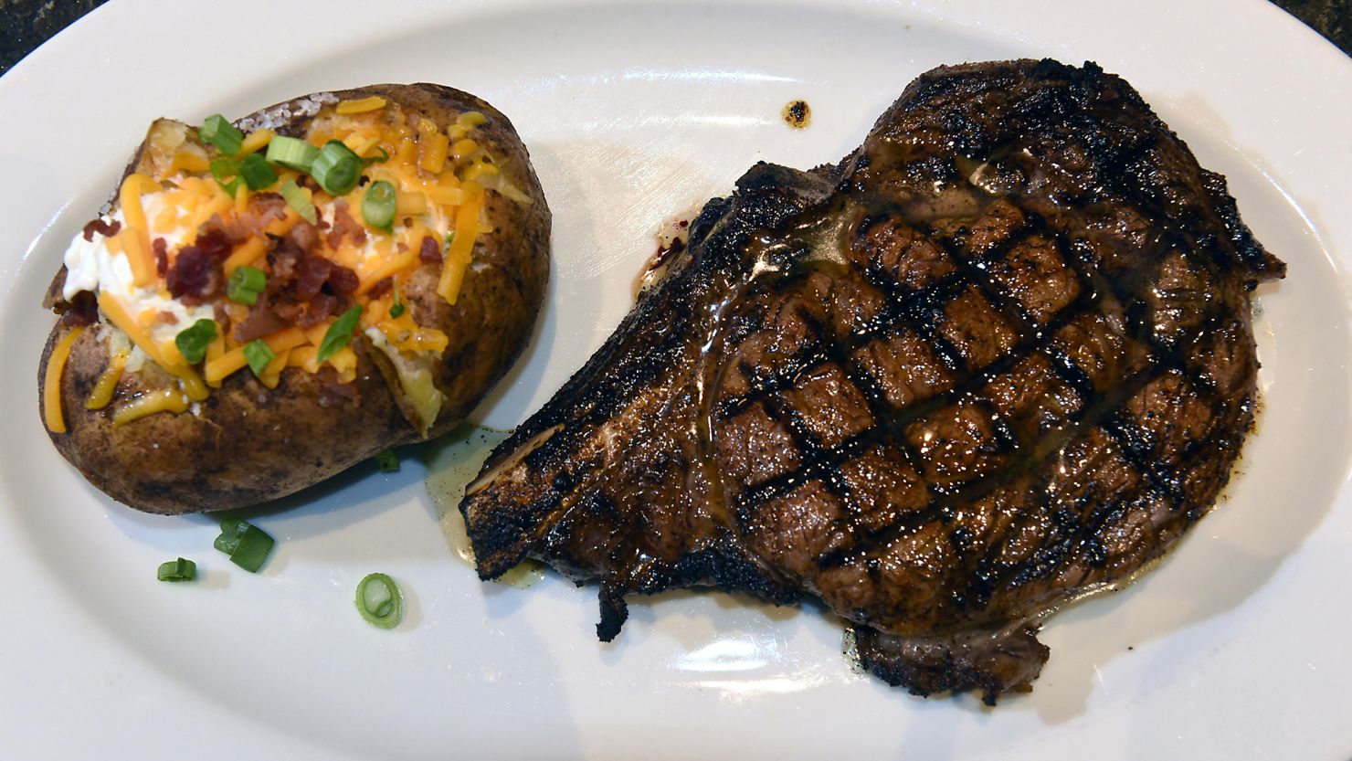 Steak and a loaded potato at LongHorn Steakhouse.