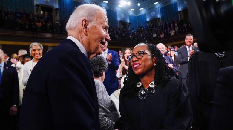 US President Joe Biden, left greets Ketanji Brown Jackson, associate justice of the US Supreme Court, while arriving for a State of the Union address at the US Capitol in Washington, DC, US, on Thursday, March 7, 2024. Election-year politics will increase the focus on Biden's remarks and lawmakers' reactions, as he's stumping to the nation just months before voters will decide control of the House, Senate, and White House. Photographer: Shawn Thew/EPA/Bloomberg via Getty Images