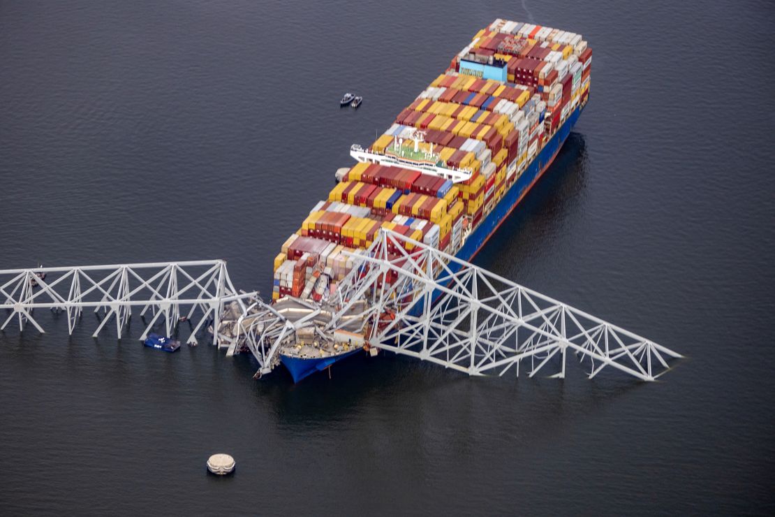 BALTIMORE, MARYLAND - MARCH 26: In an aerial view, cargo ship Dali is seen after running into and collapsing the Francis Scott Key Bridge on March 26, 2024 in Baltimore, Maryland. Rescuers are searching for at least seven people, authorities say, while two others have been pulled from the Patapsco River. (Photo by Tasos Katopodis/Getty Images)