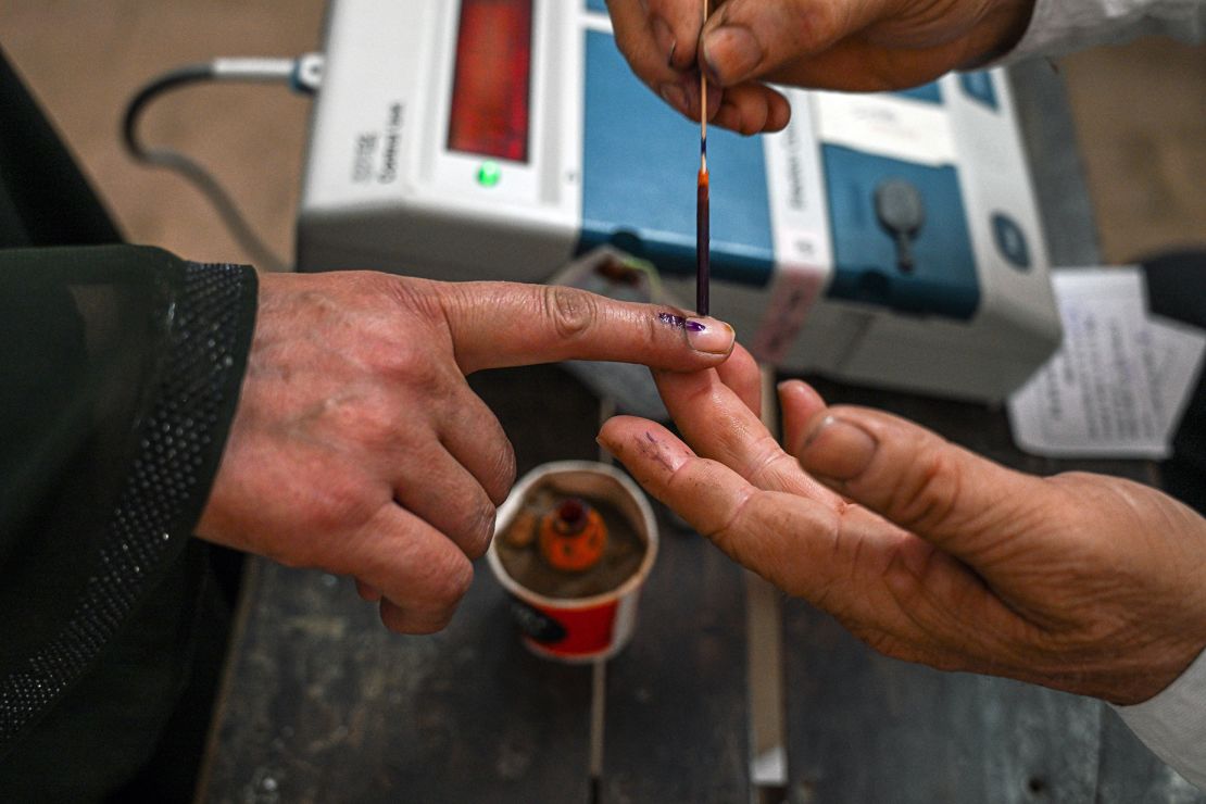 A voter's finger marked with indelible ink after casting a ballot at a polling station during the first phase of voting for national elections in Muzaffarnagar district, Uttar Pradesh, India, on Friday, April 19, 2024.