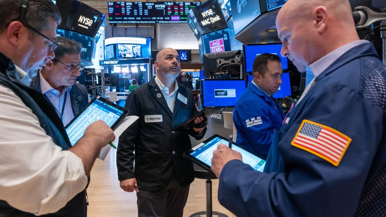 NEW YORK, NEW YORK - MAY 03: Traders work on the floor of the New York Stock Exchange (NYSE) on May 03, 2024 in New York City. The Dow surged over 400 points in morning trading as new economic numbers showed that the central bank may cut interest rates sooner than expected.  (Photo by Spencer Platt/Getty Images)