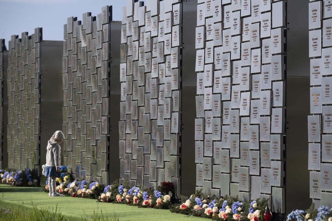 A wall of remembrance at a church in Irpin.