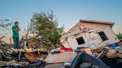 BARNSDALL, OKLAHOMA - MAY 07: The Crowder family surveys their home destroyed by a tornado on May 07, 2024 in Barnsdall, northeast Oklahoma. The EF3 twister that struck claimed one life and destroyed dozens of homes in the community of just over 1,000 people. (Photo by Brandon Bell/Getty Images)