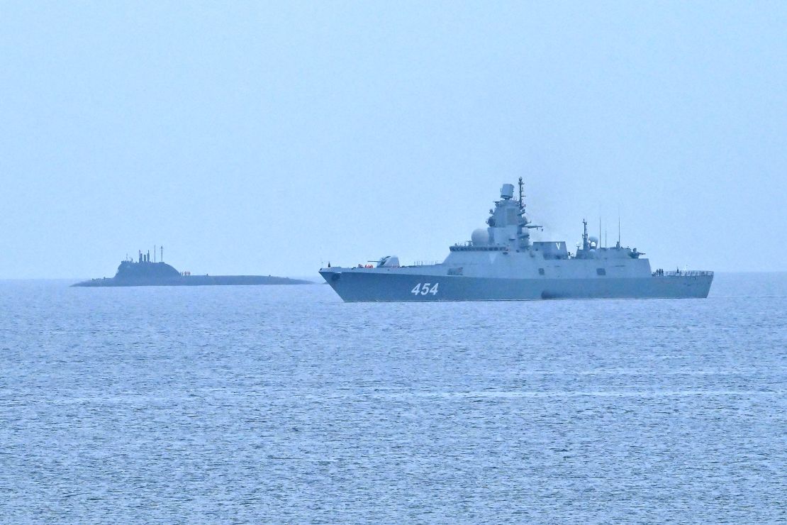 The Russian nuclear-powered submarine Kazan (left) and the class frigate Admiral Gorshkov, part of the Russian naval detachment visiting Cuba, arrive at Havana's harbour, June 12, 2024.