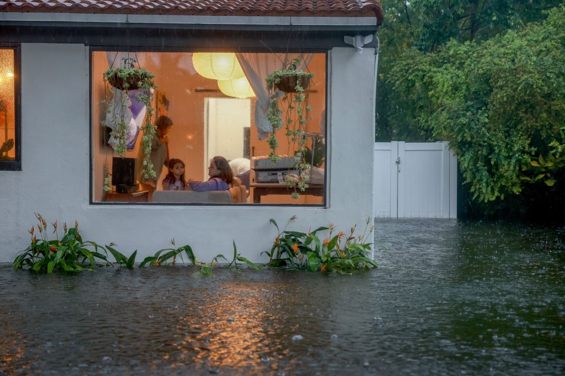 Floodwaters surround a home on June 12, 2024, in Hollywood, Florida.