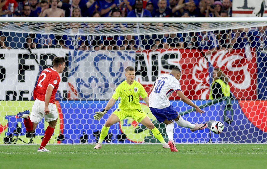 High-profile players such as Mbappe - pictured here shooting for France at Euro 2024 - are often forced to