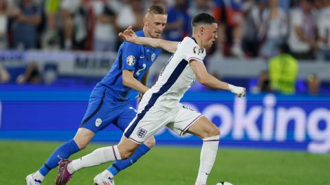 COLOGNE, GERMANY - JUNE 25: Zan Karnicnik of Slovenia and Phil Foden of England on the ball during the UEFA EURO 2024 group stage match between England and Slovenia at Cologne Stadium on June 25, 2024 in Cologne, Germany. (Photo by Richard Sellers/Sportsphoto/Allstar via Getty Images)