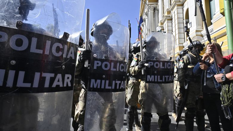 Military troops are deployed outside the Quemado Palace at the Plaza de Armas in La Paz on June 26, 2024. Bolivian President Luis Arce on Wednesday denounced the unauthorized gathering of soldiers and tanks outside government buildings in the capital La Paz, saying "democracy must be respected." "We denounce irregular mobilizations by some units of the Bolivian Army," Arce wrote on the X social network. Former president Evo Morales wrote on the same medium that "a coup d'état is brewing." (Photo by AIZAR RALDES / AFP) (Photo by AIZAR RALDES/AFP via Getty Images)